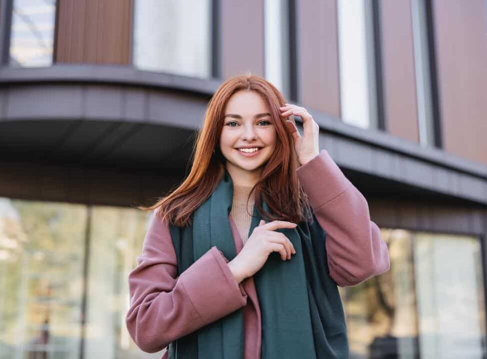 Beautiful-young-woman-bright-smile-outside-happy-coat Before and after